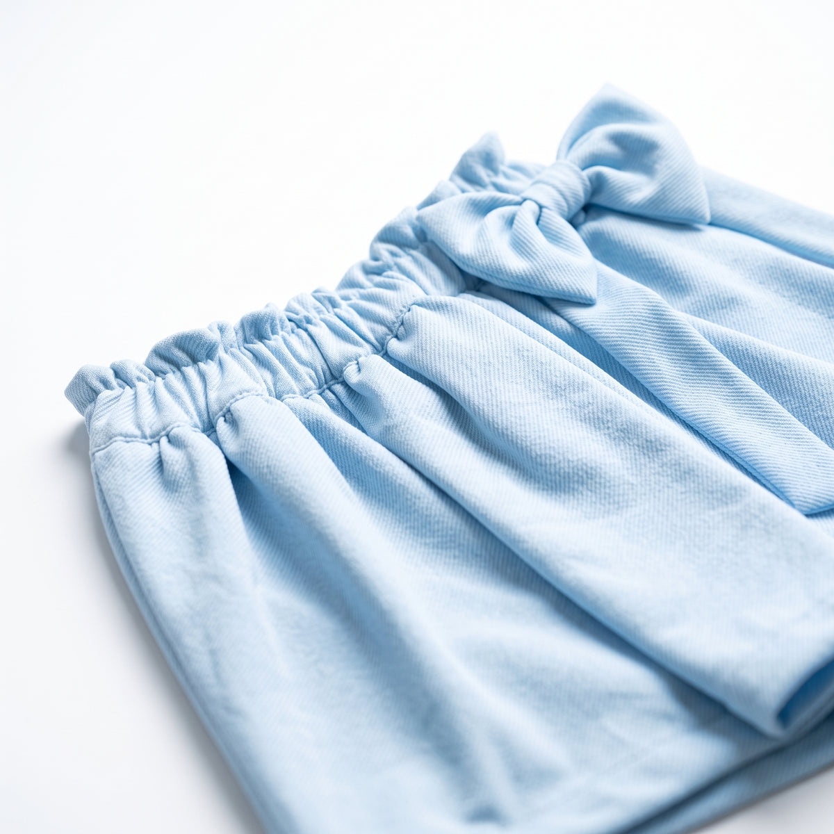 Blusita Glitter + Falda Short Moño